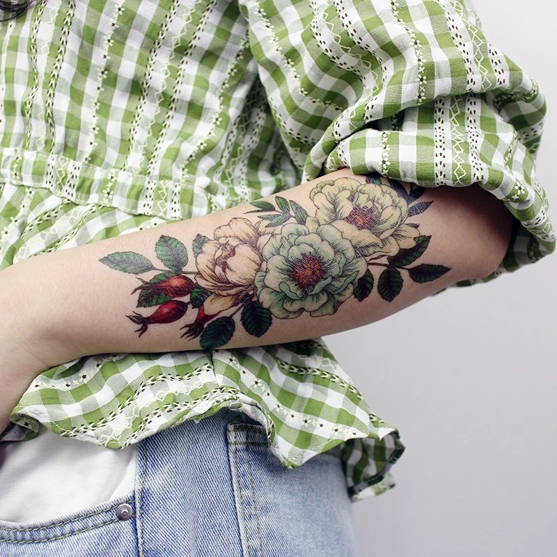 Allison Green Flower, Rose Hip Tattoo | Steal Her Style